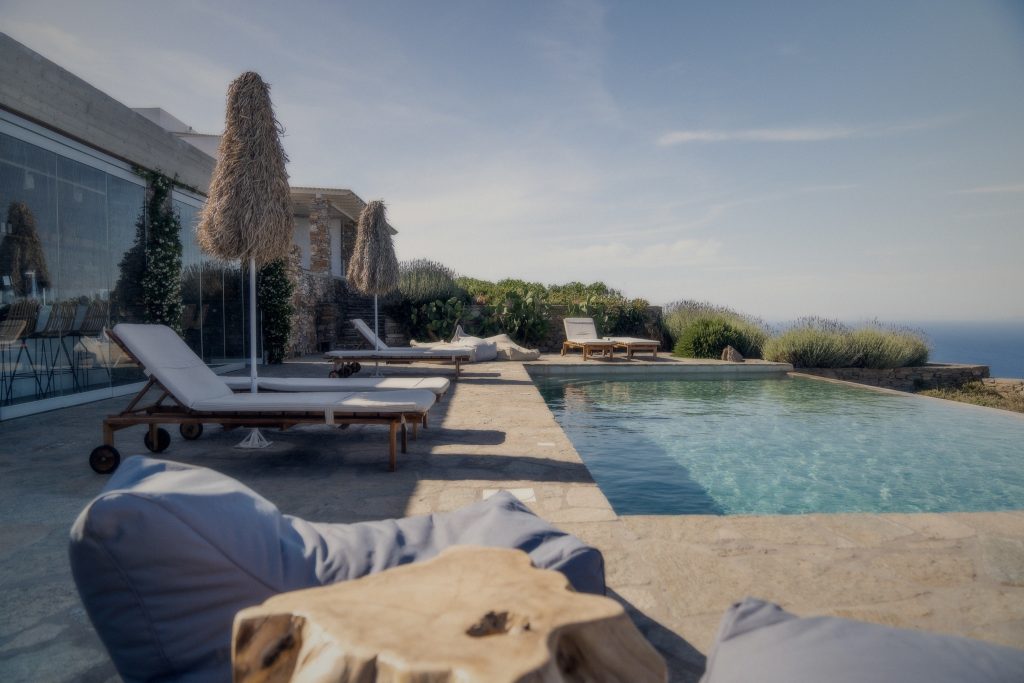 Astarte Luxury Apartments — infinity pool overlooking the Aegean